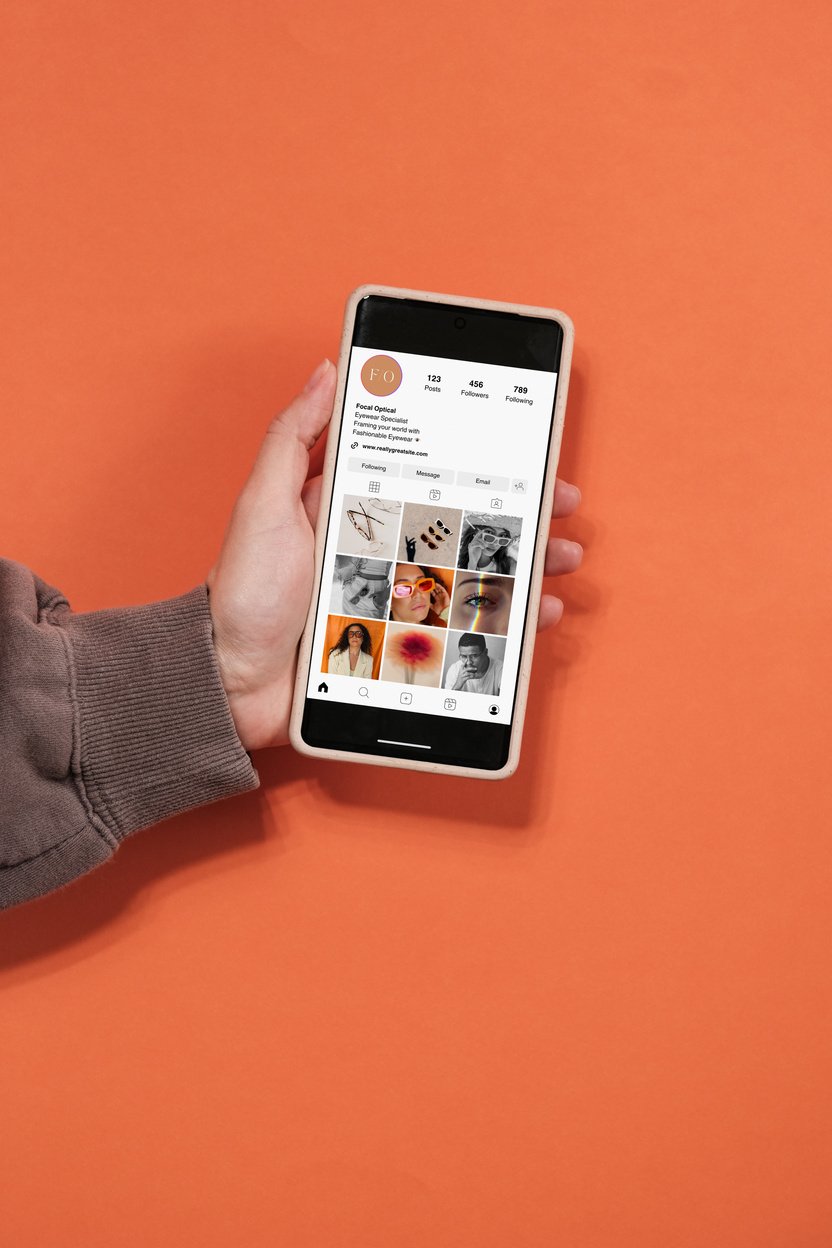 Social Media Mockup on Smartphone on Orange Background